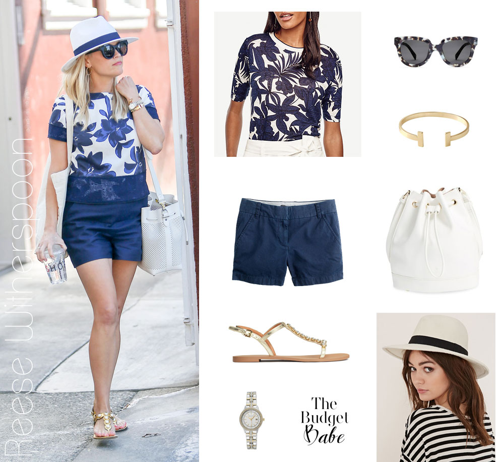 Reese Witherspoon wears a blue floral top, blue shorts and white bucket bag while out and about.
