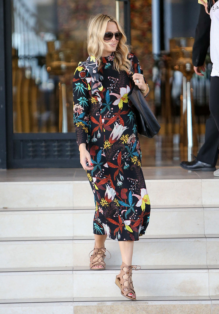 Molly Sims wears the fall floral trend in her H&M maxi dress that's under $20!