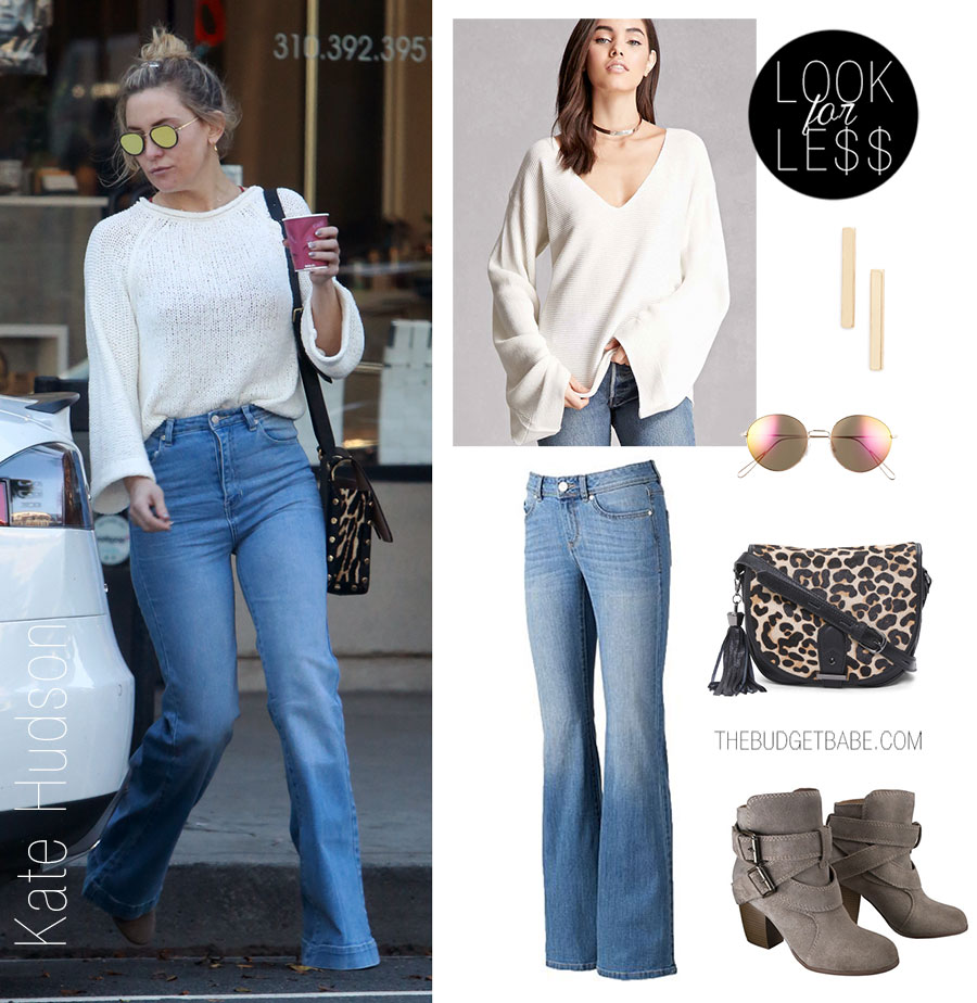Kate Hudson styles her white bell sleeve sweater with flare leg jeans and ankle boots.