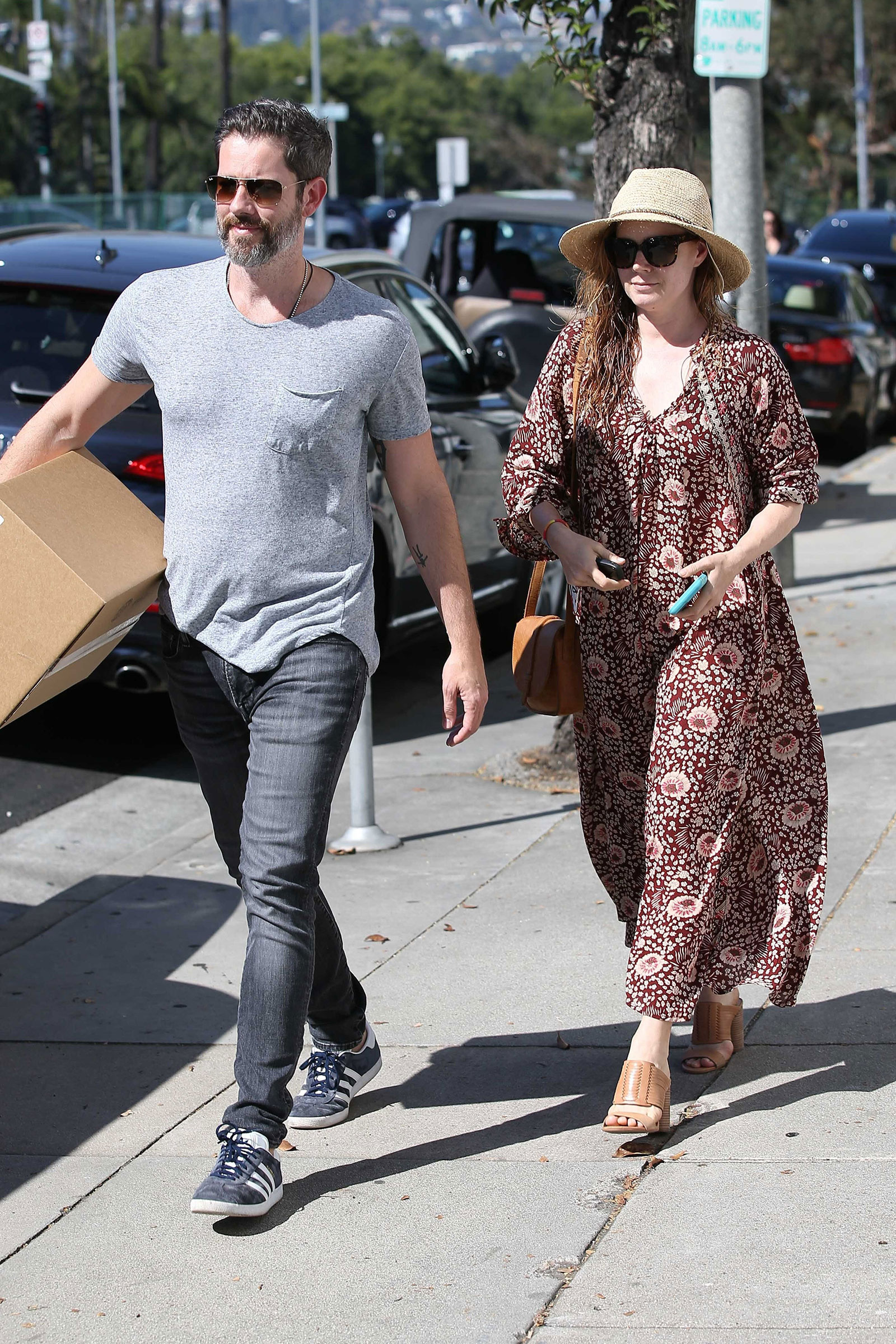 Amy Adams looks summery in a maxi dress and huarache slide sandals.