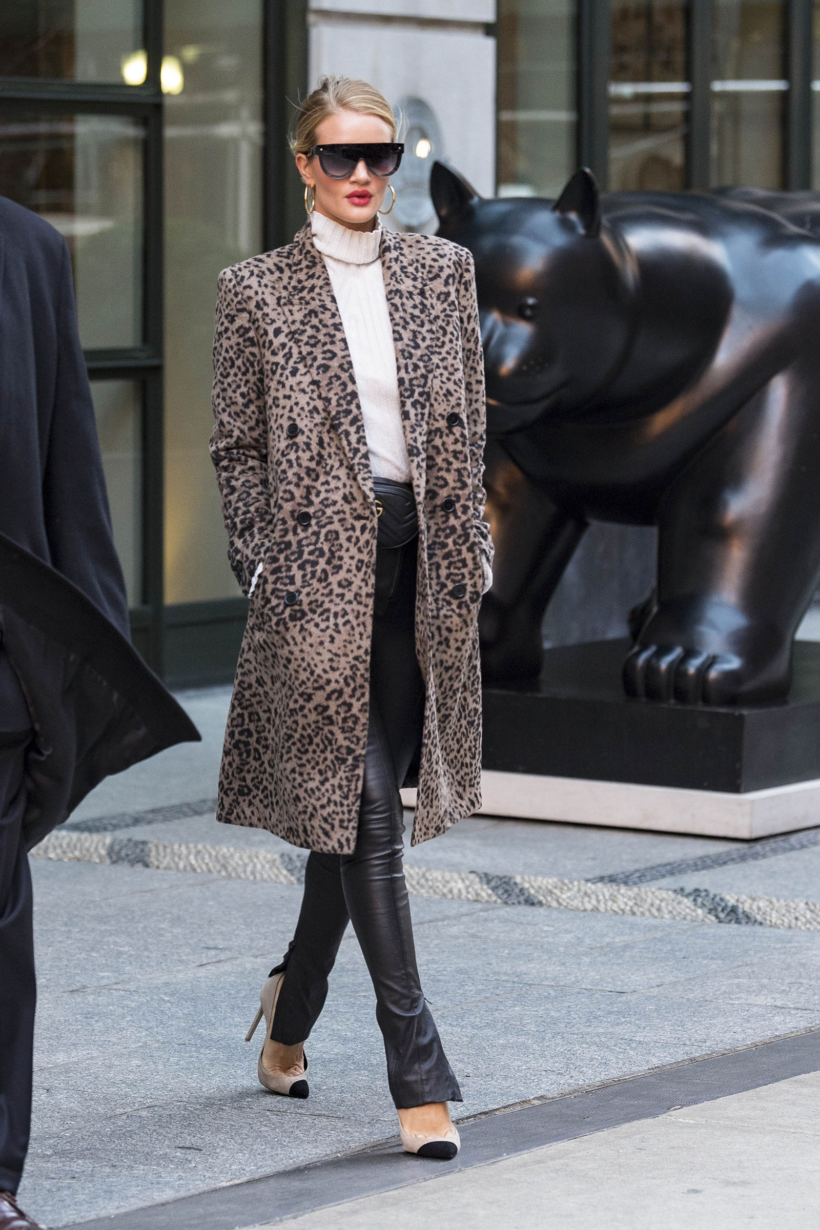 Rosie Huntington-Whiteley wears a leopard coat with leather pants and cap-toe pumps