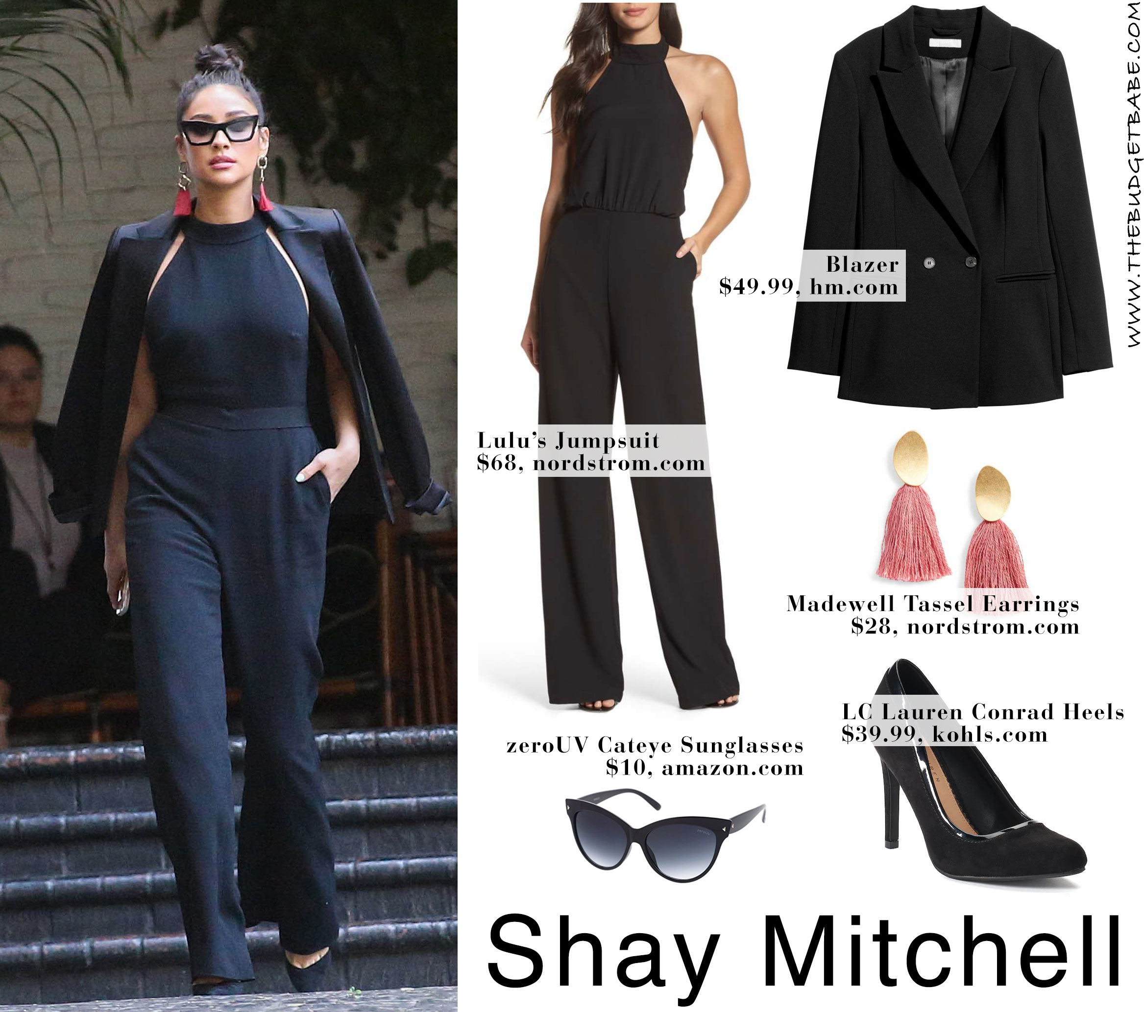 Shay Mitchell looks chic in a black jumpsuit and pink tassel earrings.