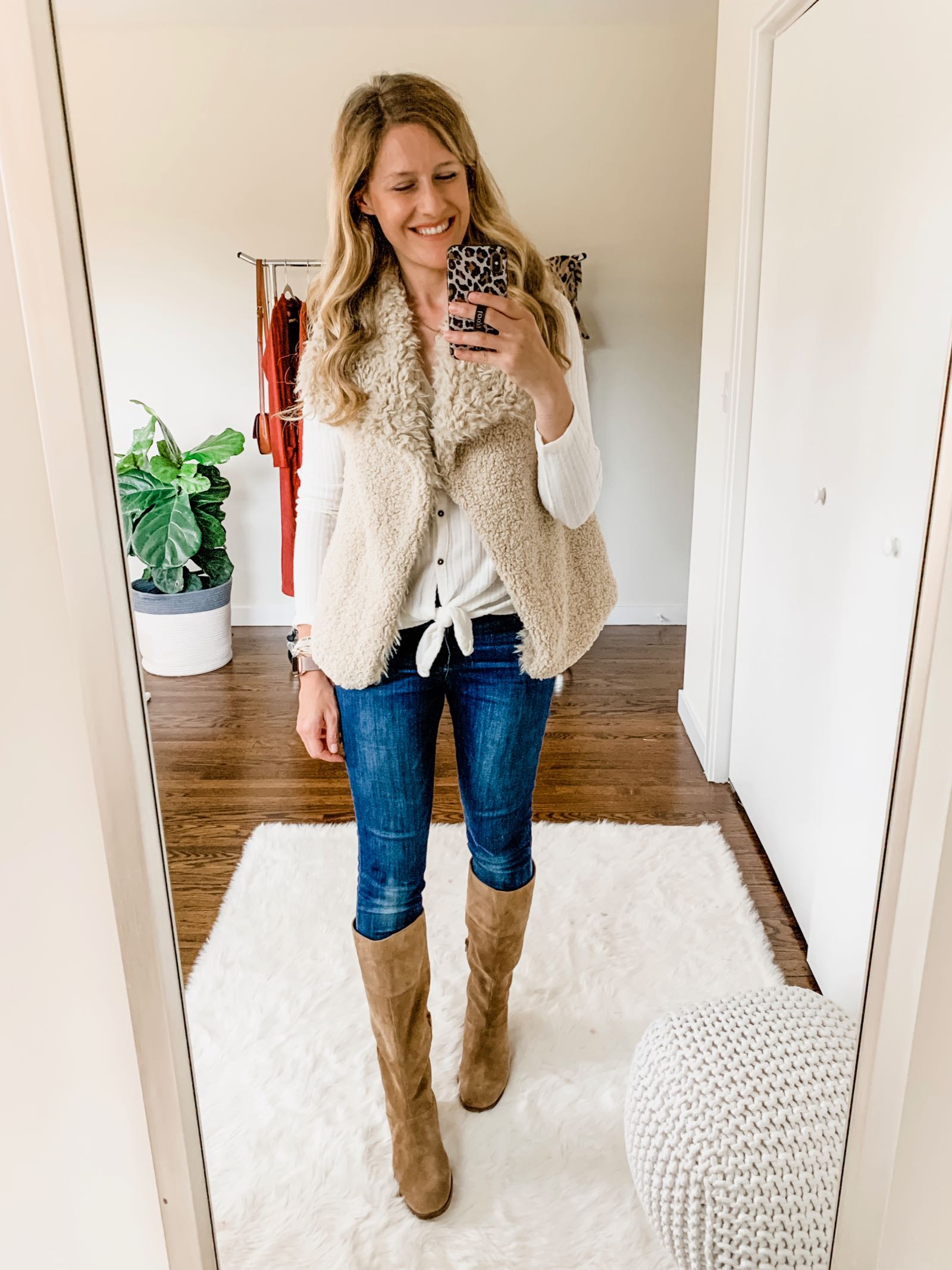 Fall outfit idea with shearling vest and tall suede boots on a budget // The Budget Babe Fashion Blog