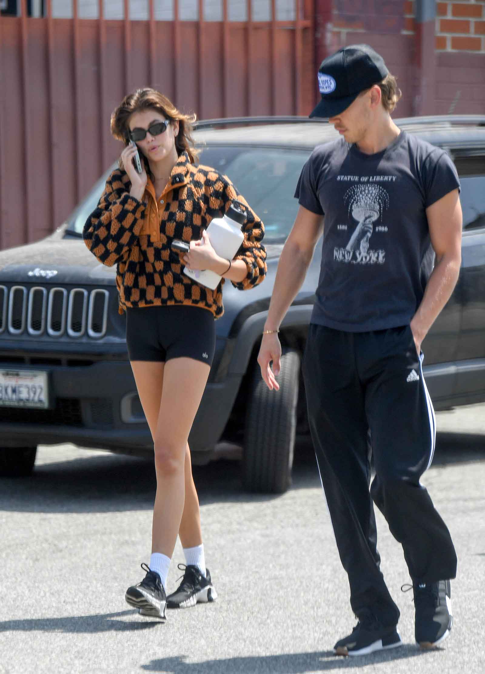 Kaia Gerber's Free People checkered quarter zip fleece pullover look for less