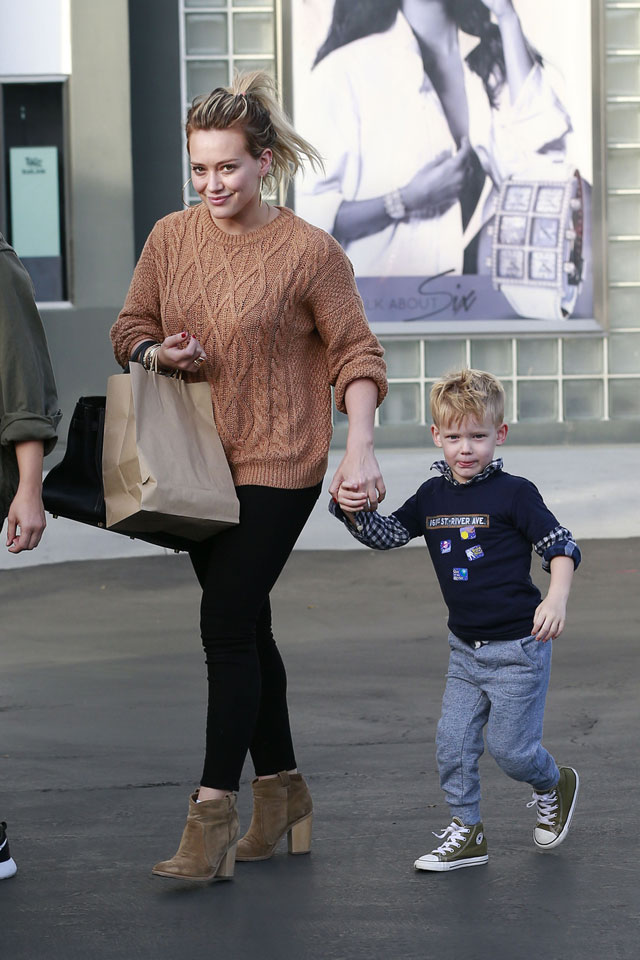 Hilary Duff's cableknit sweater and ankle boots look for less