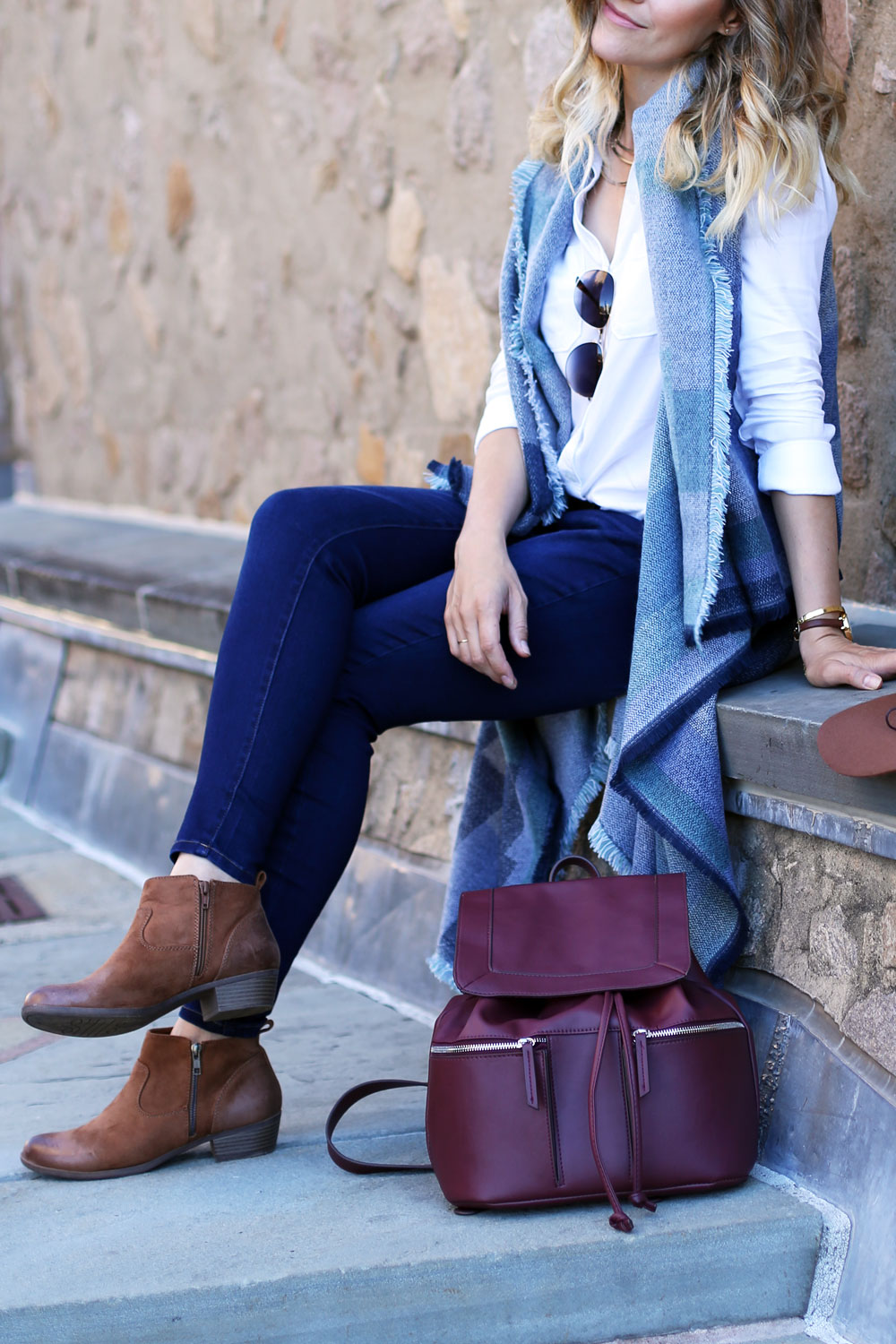 Pair a sweater vest with a basic top, skinny jeans and ankle boots for a cool back-to-school outfit from Kohl's.
