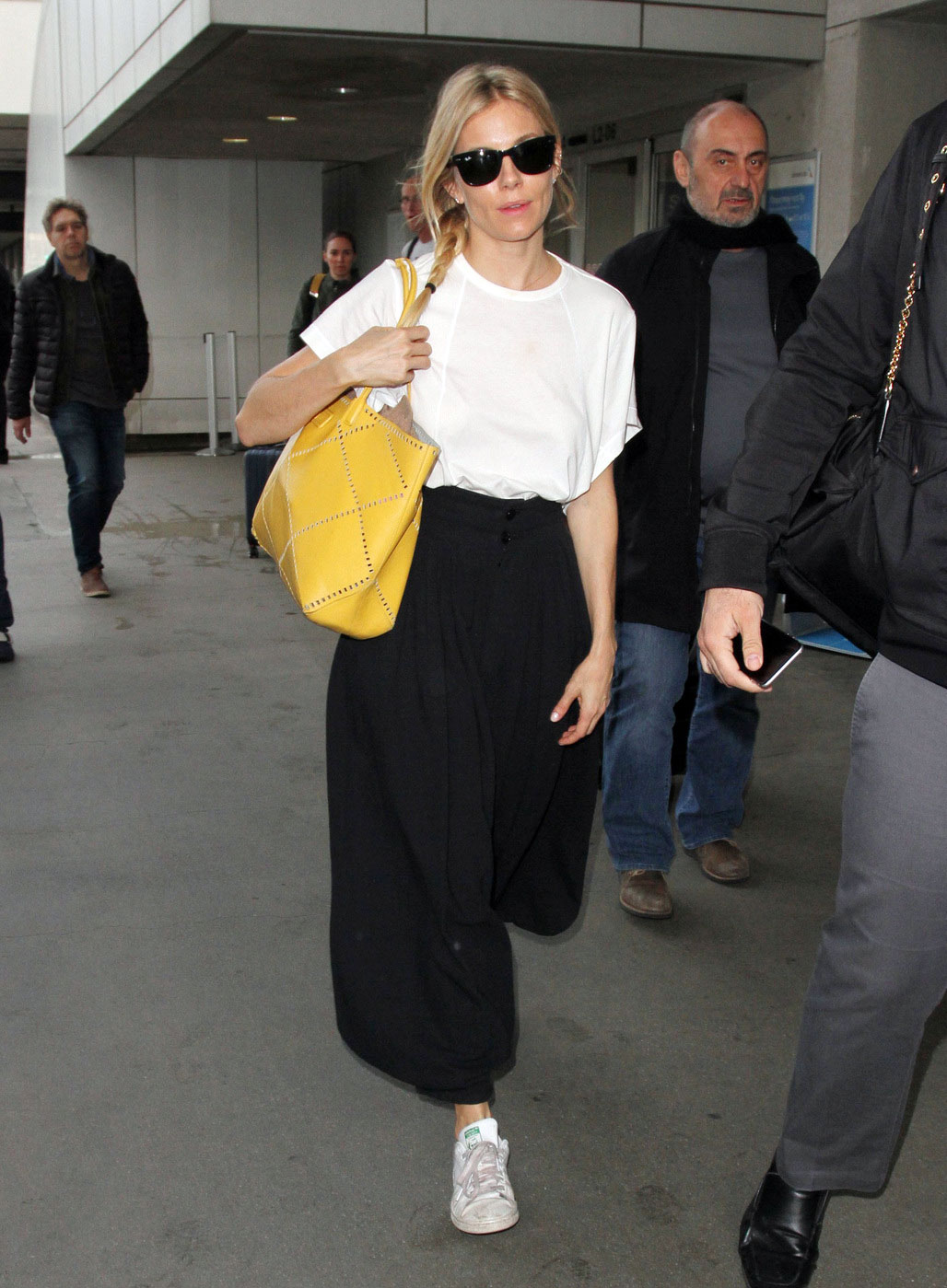 See how to recreate Sienna Miller's eclectic airport style with pieces starting at just $15.