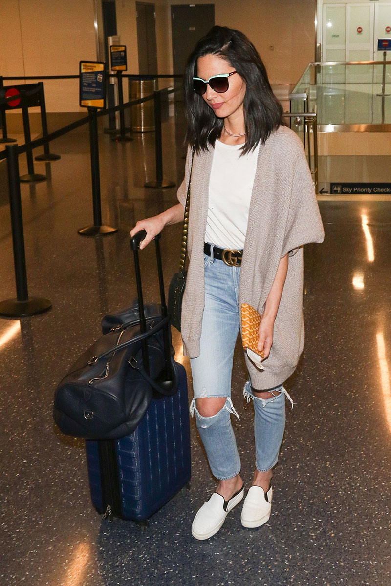 Get inspired by Olivia Munn's stylish airport style.