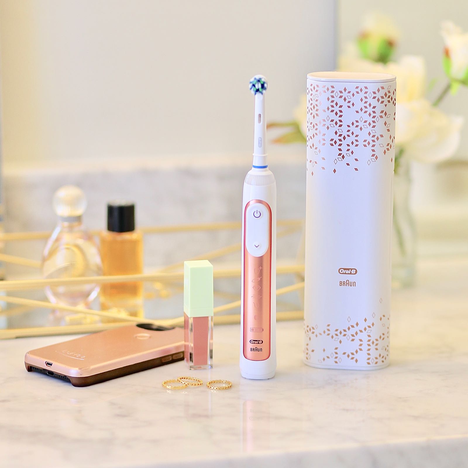 Enter for your chance to win the gorgeous new Oral-B GENIUS Rose Gold 8000 rechargeable toothbrush! TheBudgetBabe.com