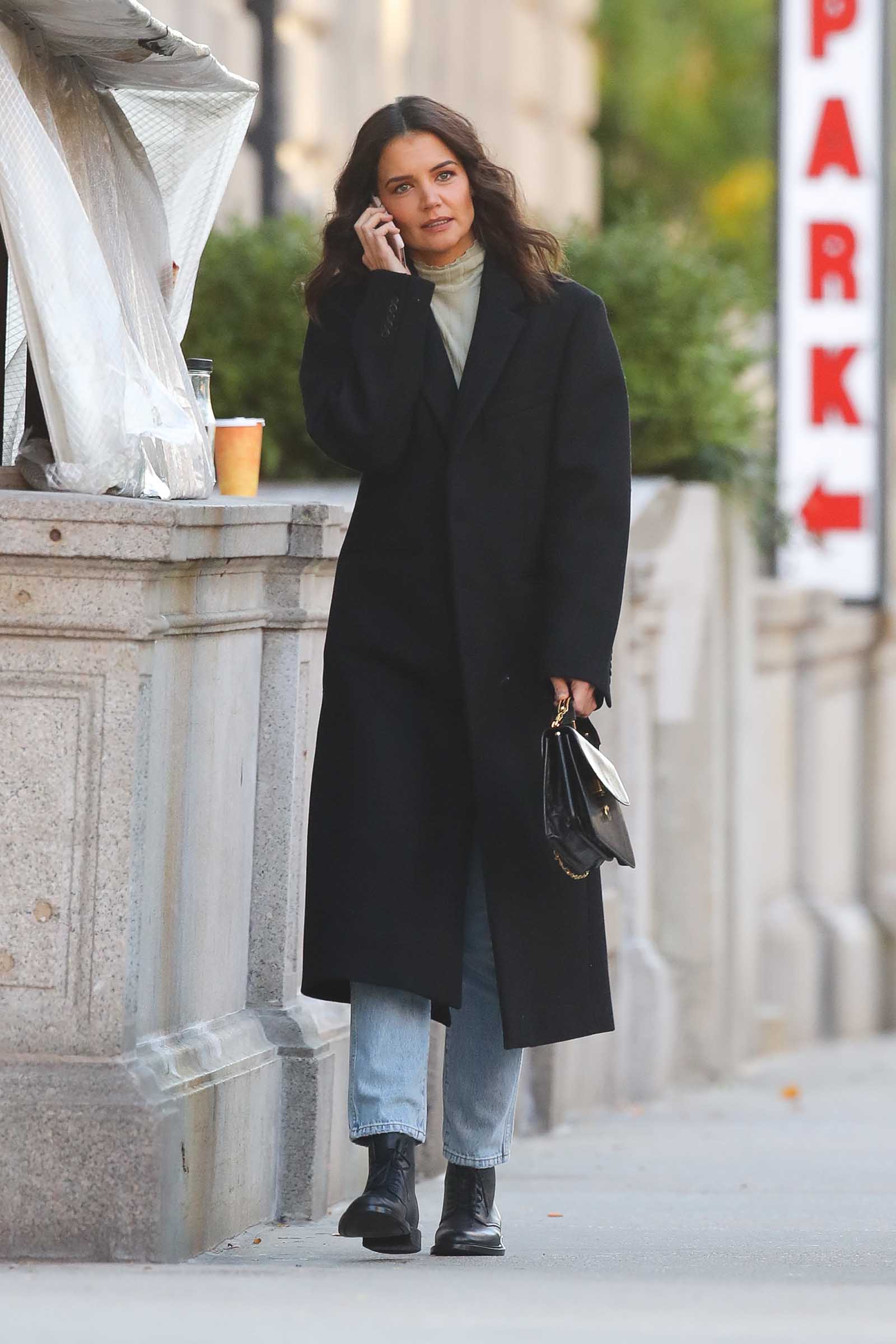 Katie Holmes steps out in a functional and stylish wool overcoat that we love!